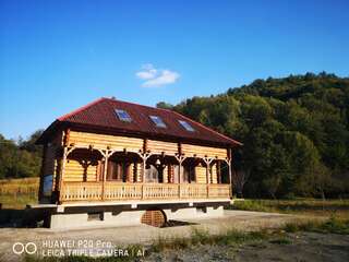 Фото Гостевой дом Casa de peste râu г. Copalnic Mănăştur